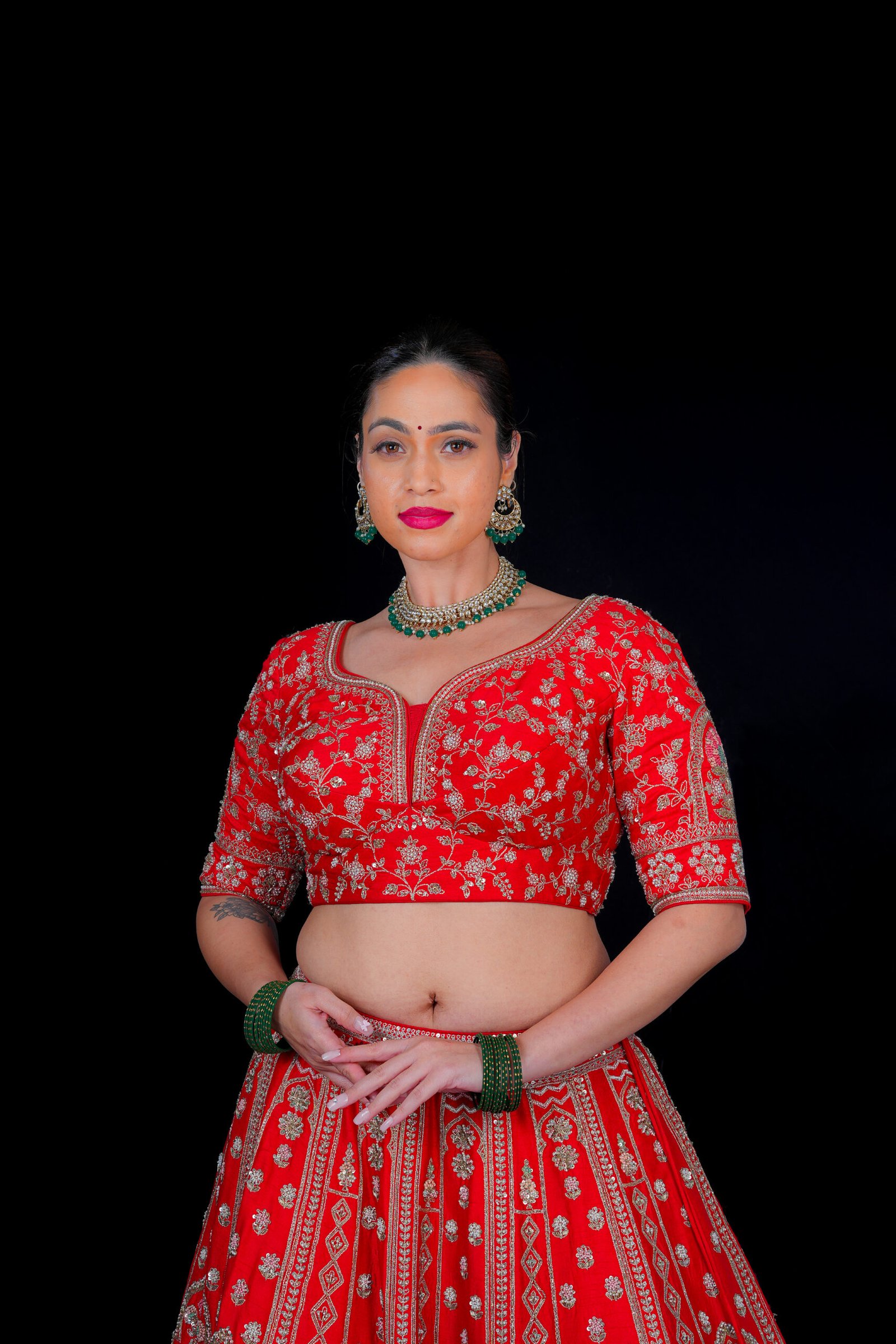 Red Pearl work embroidered Bridal lehenga